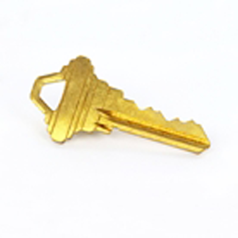 Key stamped with ”SC1” for use in cylinder locks on chute intake doors